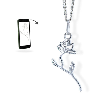 Collier unique en argent, façonné à la main à partir d’un dessin de rose, bijou personnalisé et symbolique.